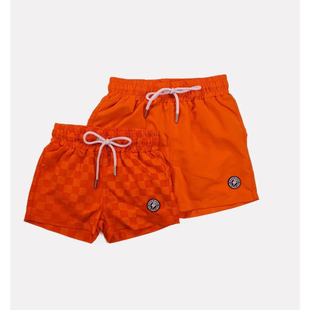 NEW FLETCH boy's water-activated checker swim trunk in neon orange